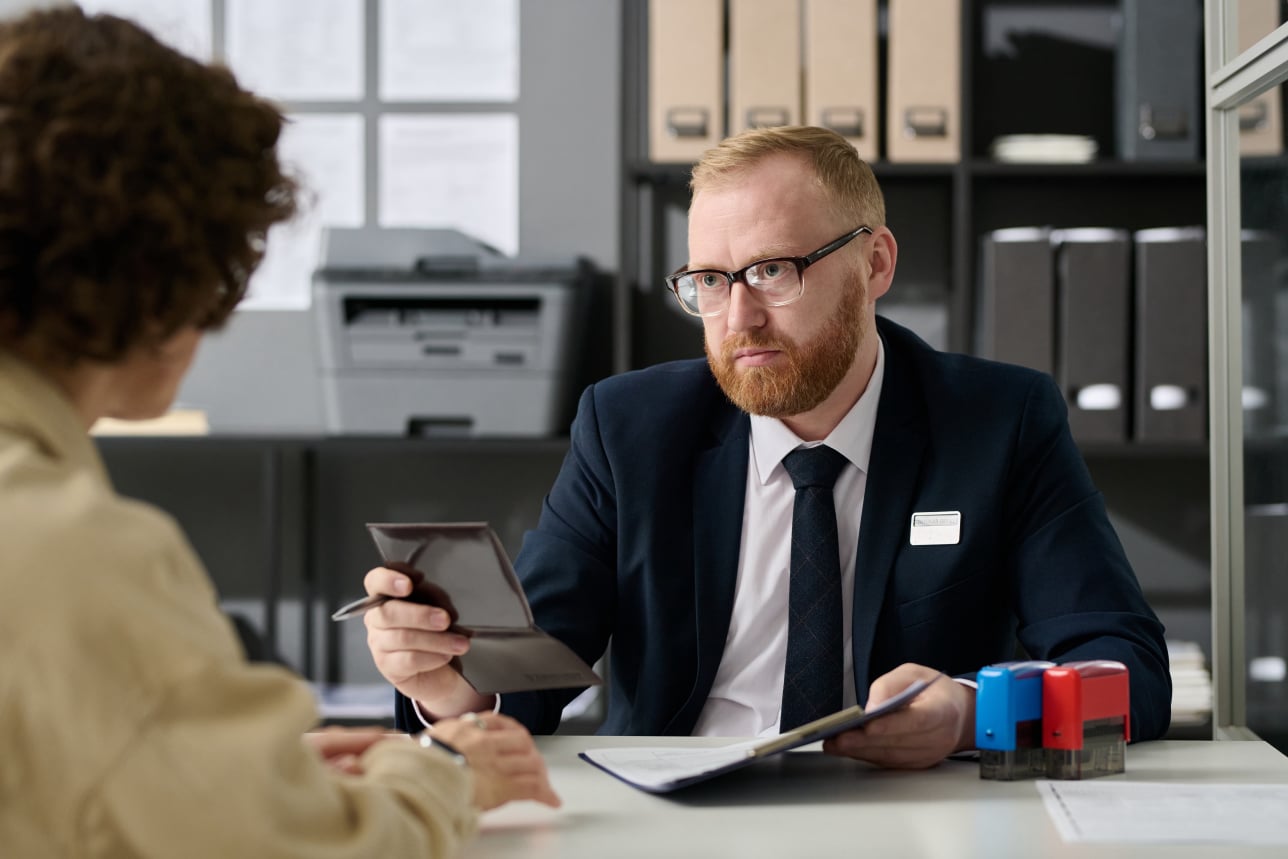 Image of a Visa Officer interviewing a candidate